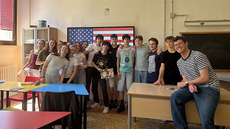 group of students and a teacher posing as a group for the camera