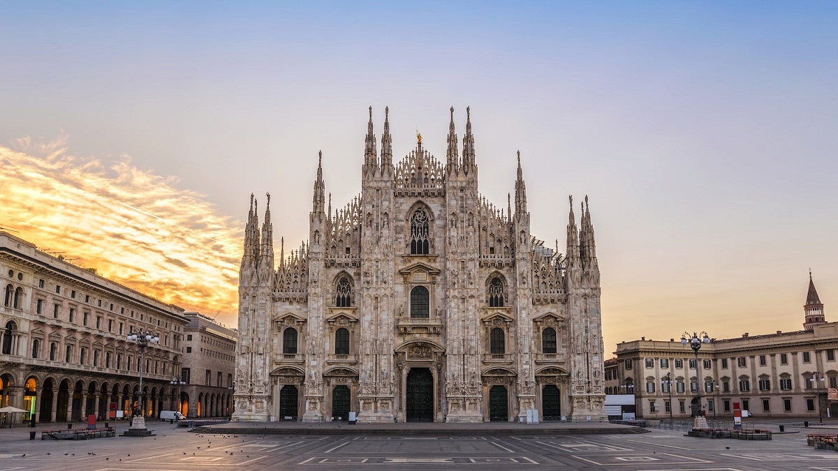 sun rising on the cathedral in milan