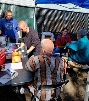 Jo Weaver and crew exam homelesses health